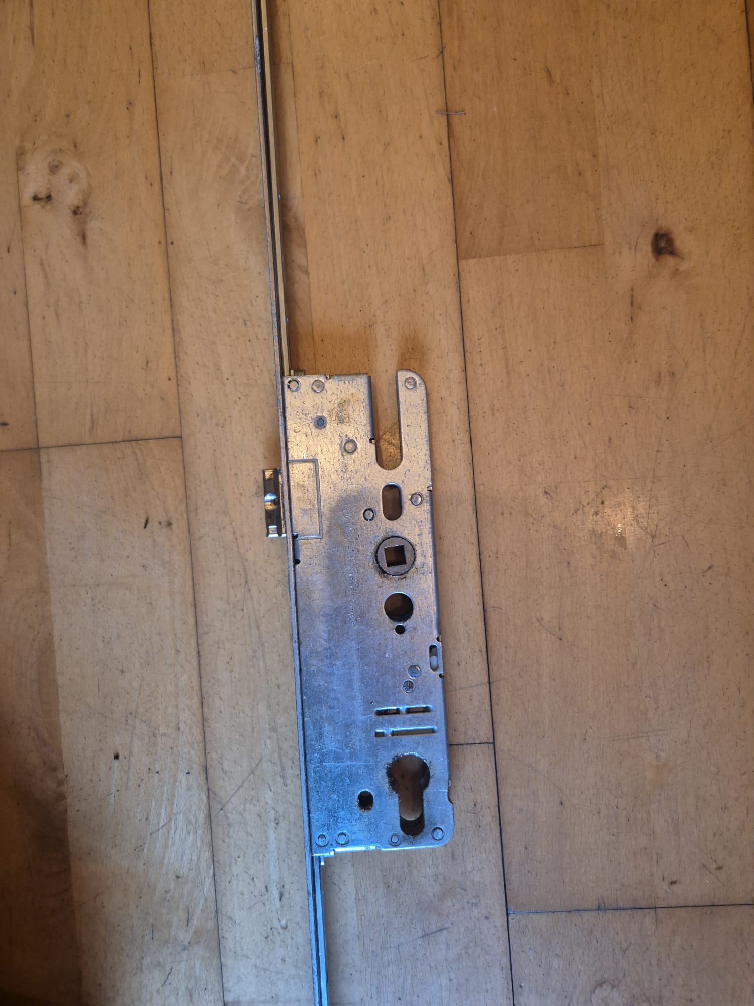 Belfast locksmith installing door lock Master Locksmith NI
